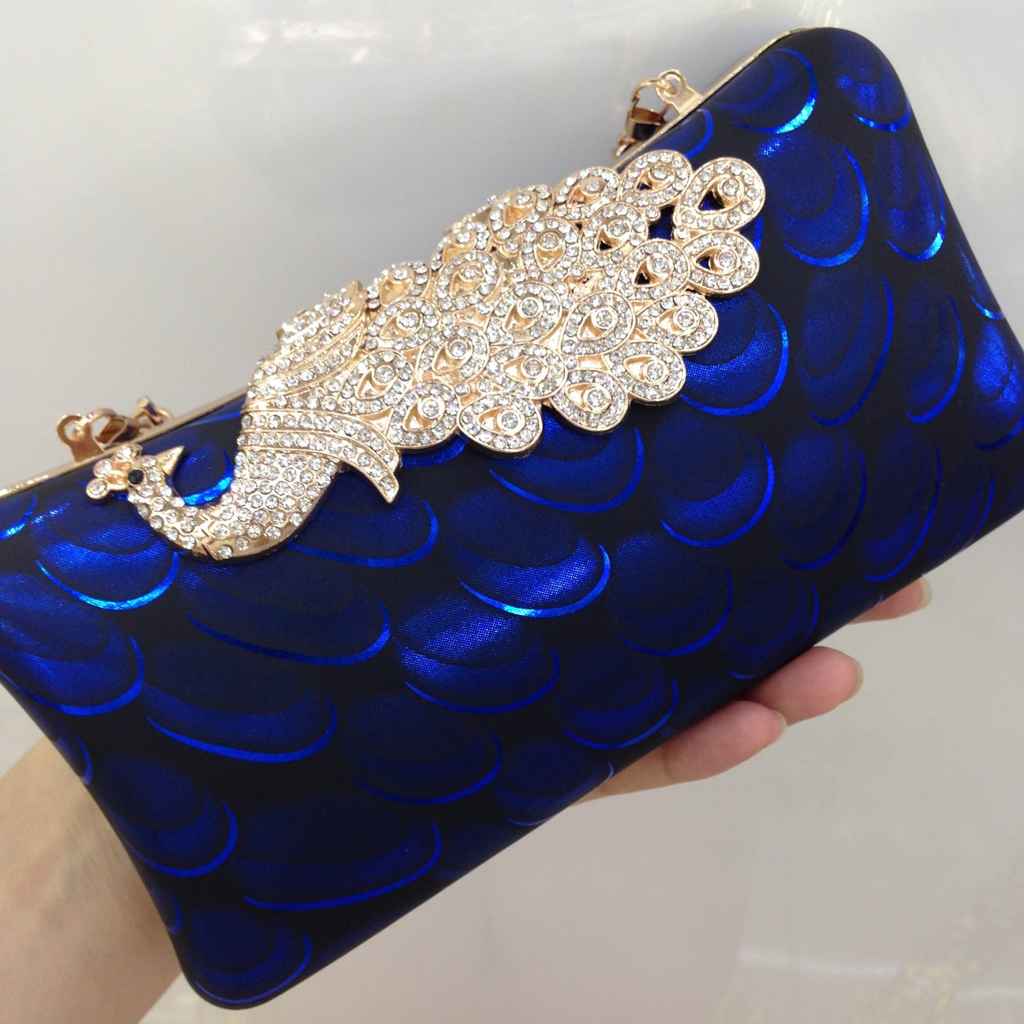 Diamond-encrusted Peacock Leather Clutch