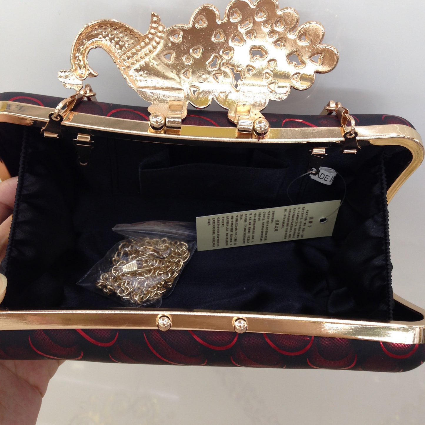 Diamond-encrusted Peacock Leather Clutch